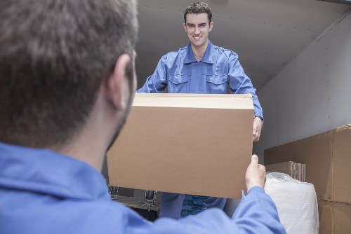 Packing boxes and preparing items for removals in Sydenham